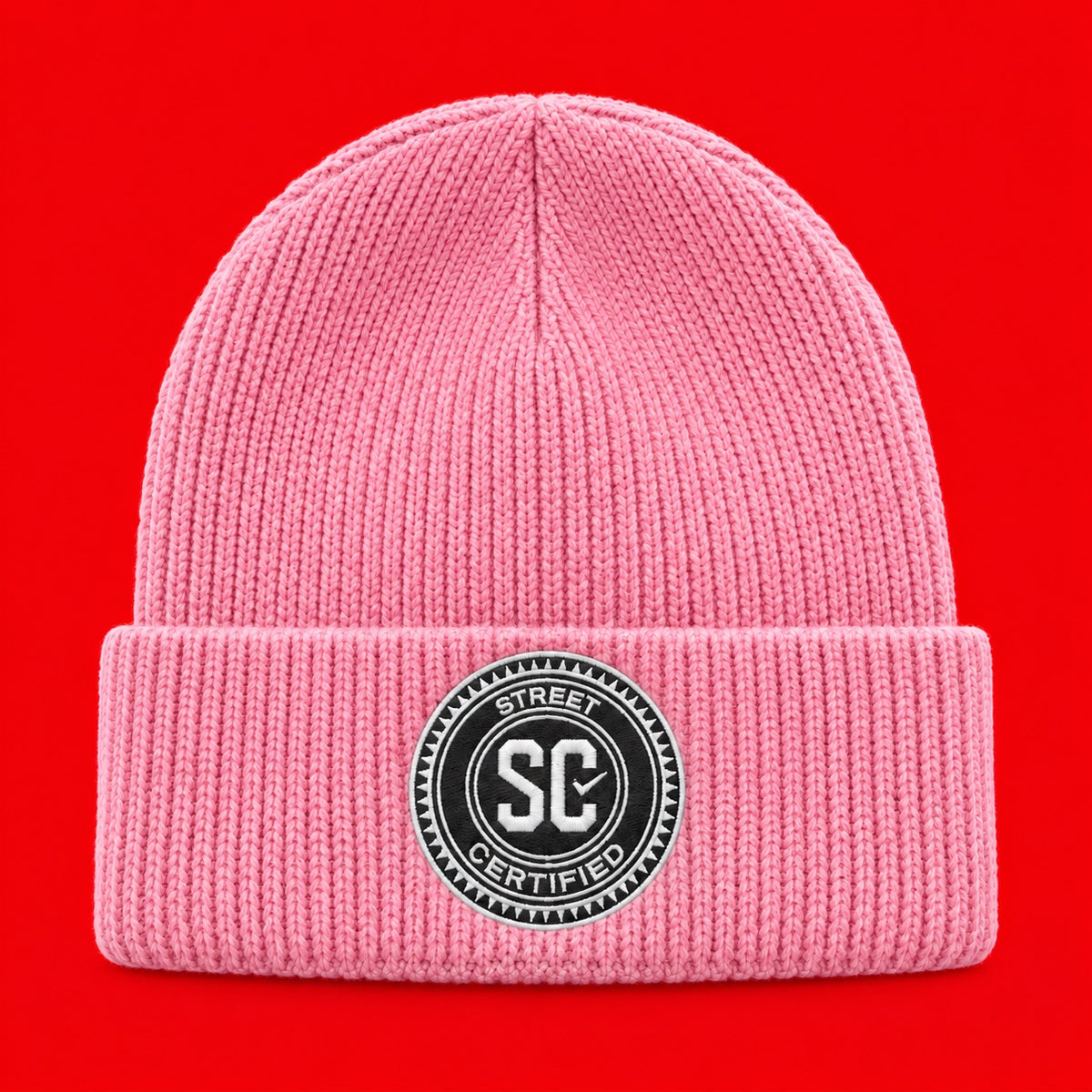 Street Certified Signature Cuffed Beanie in Pink on a red background