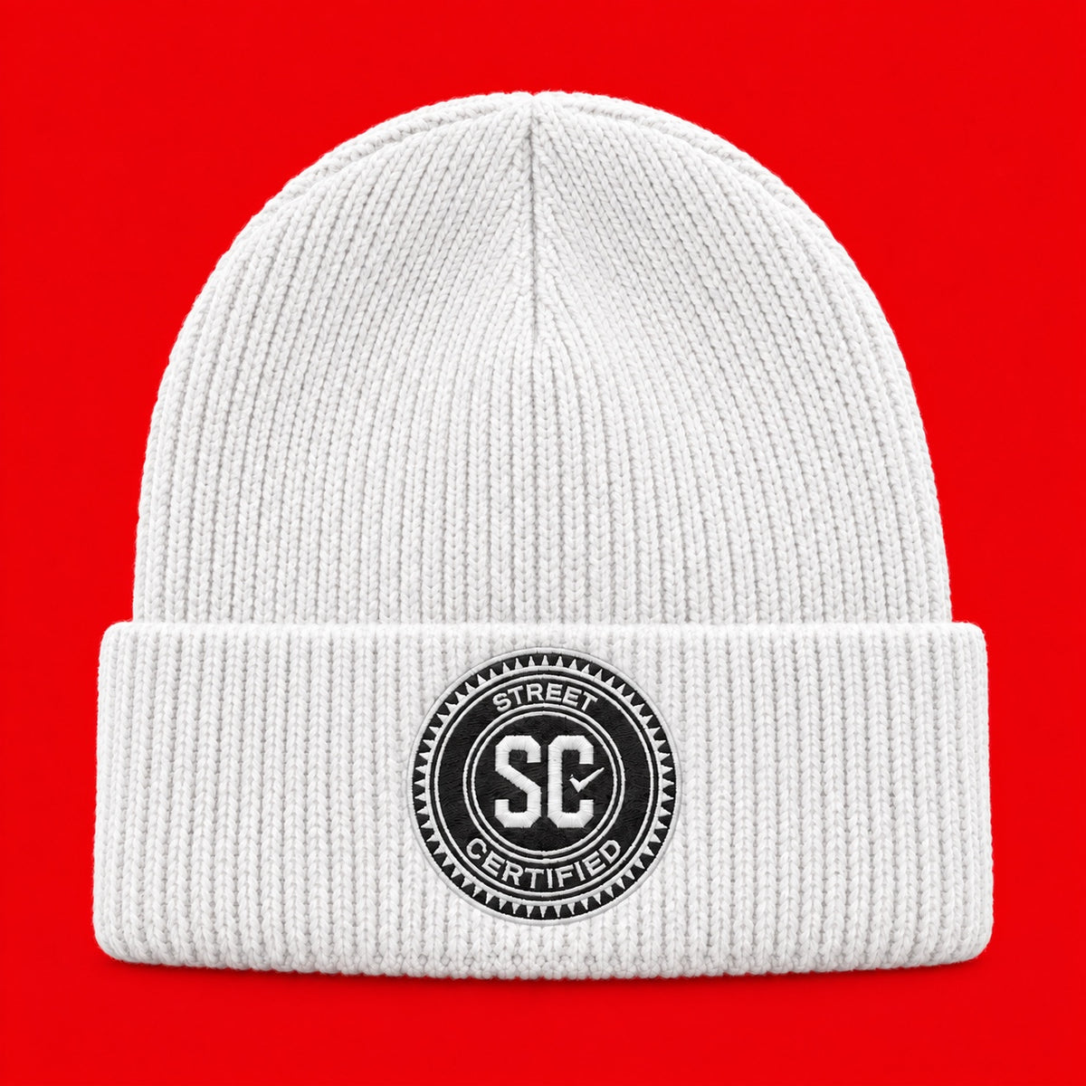 Street Certified Signature Cuffed Beanie in White on a red background