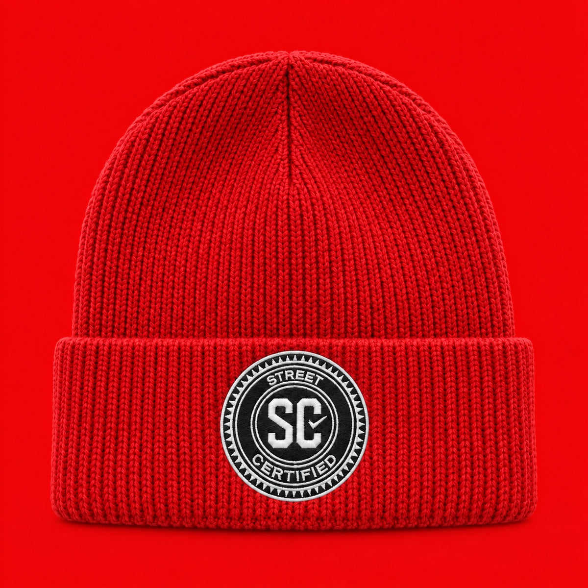 Street Certified Signature Cuffed Beanie in Red on a red background