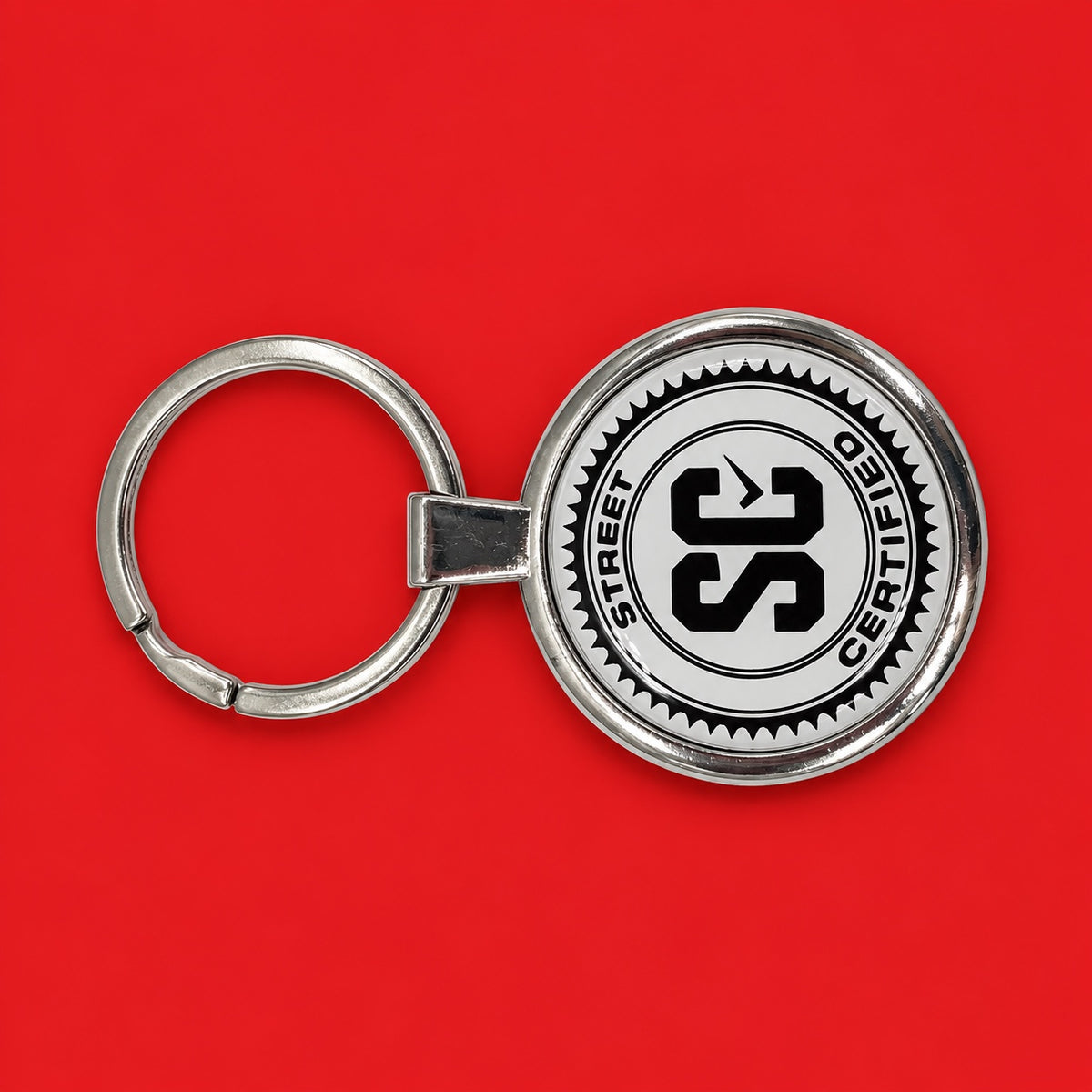 Street Certified Signature Logo Keychain in White on a red background