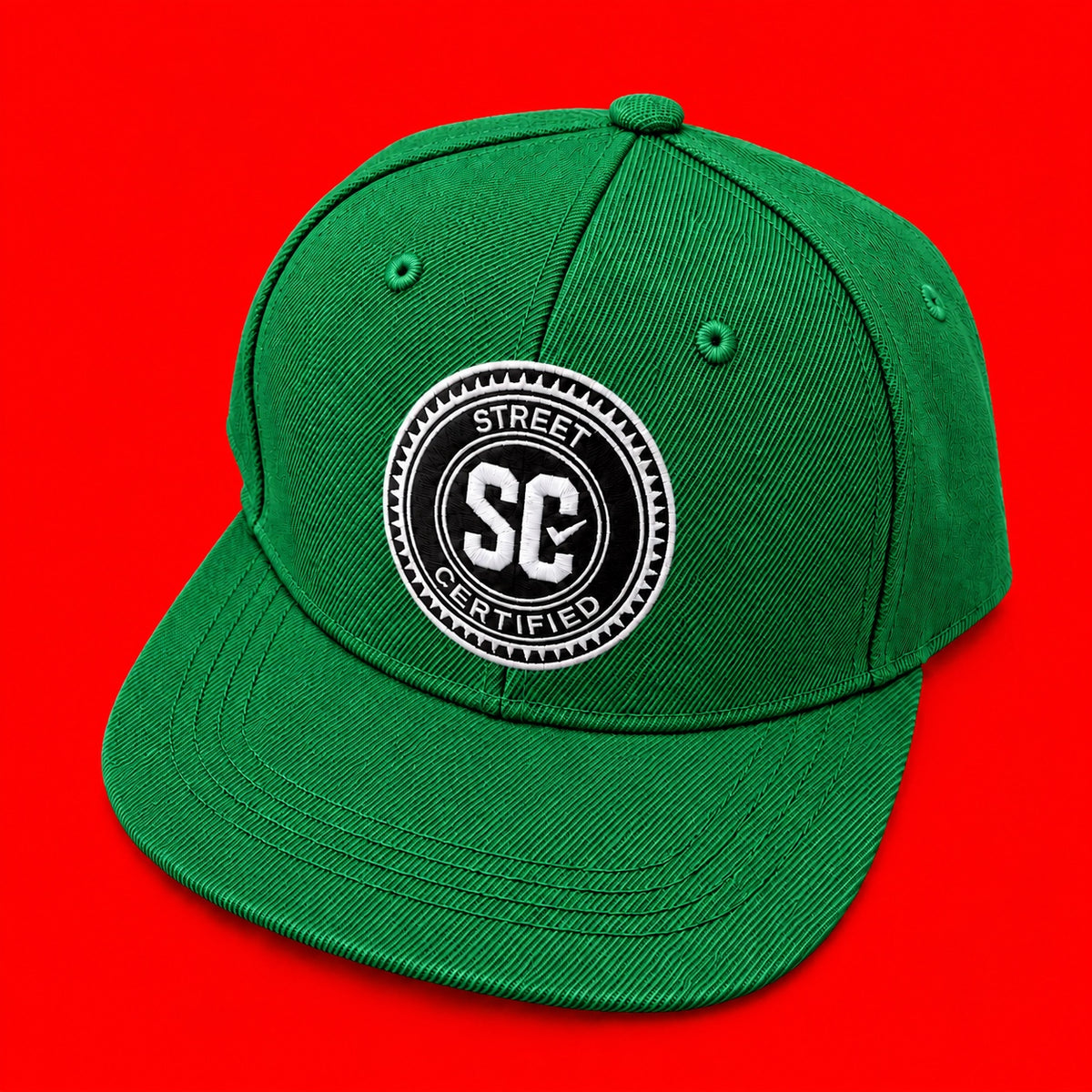 Street Certified Signature Logo Snapback in Green on a red background