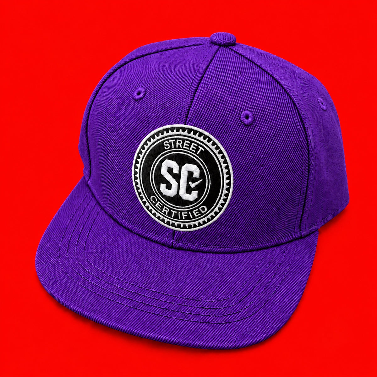 Street Certified Signature Logo Snapback in Purple on a red background