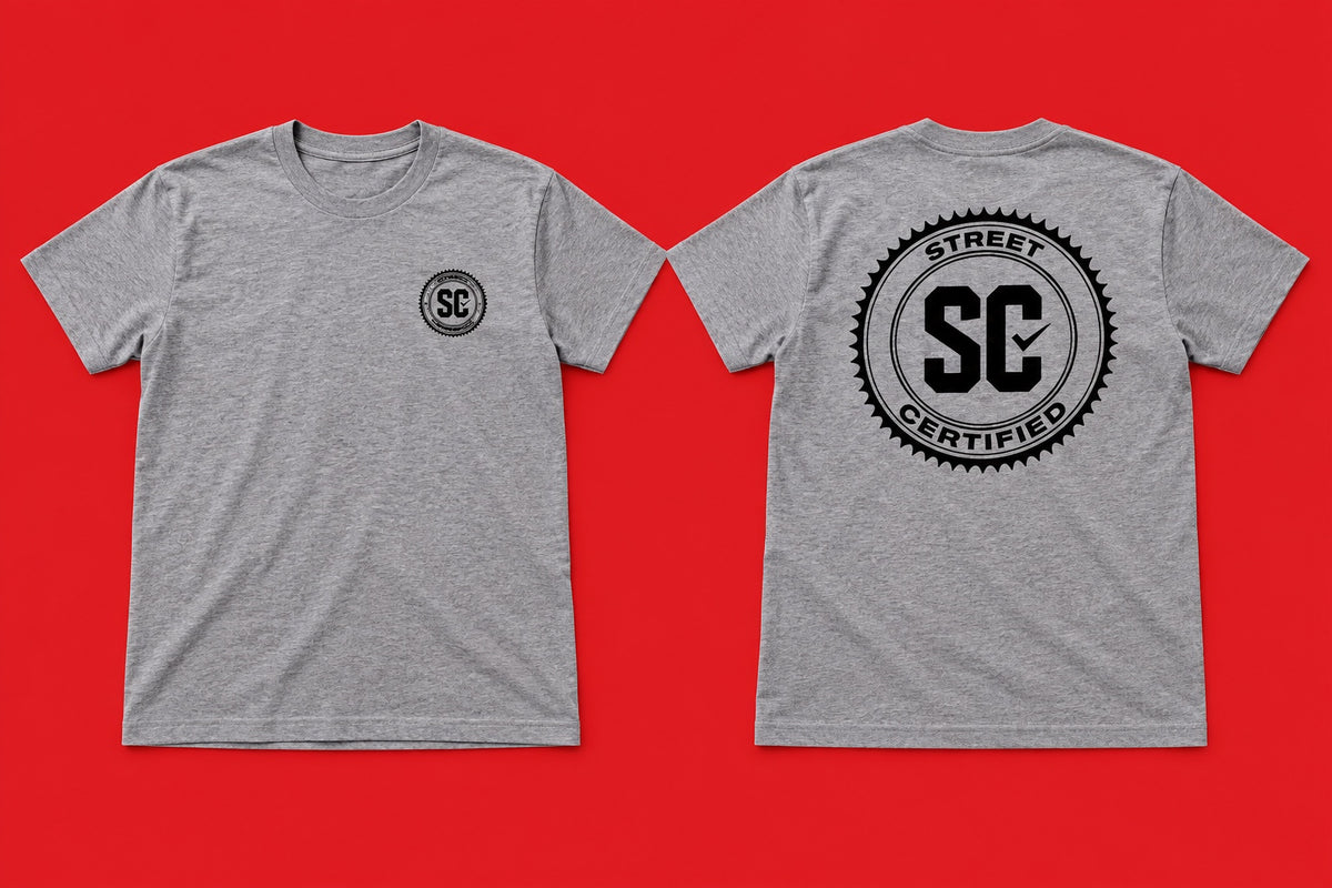 Street Certified Signature Logo Tee in Gray on a red background